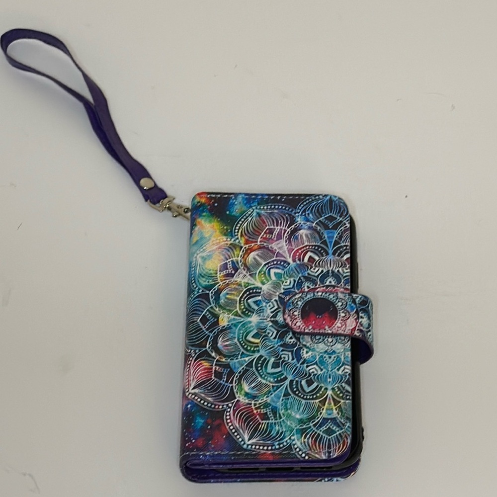 iPhone 11 decorative phone case with magnetic strap closure. Room inside etc